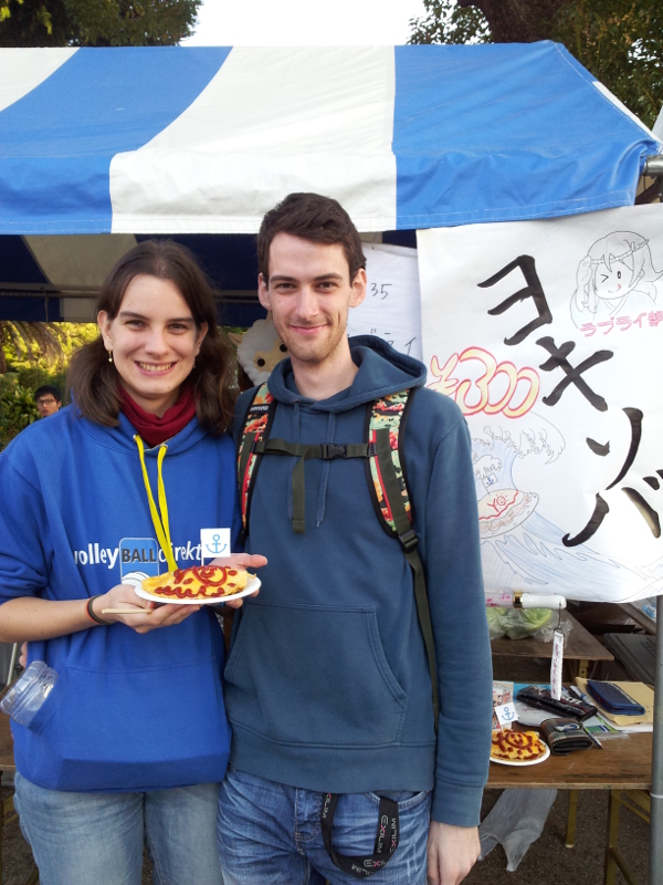 Martina and I in front of a booth